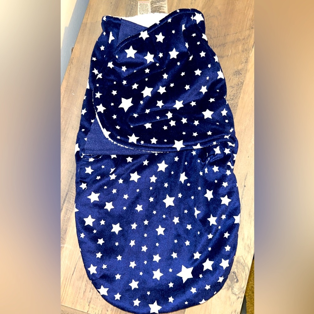 Very soft, fleece with Velcro baby swaddle, very warm, very snuggly. White/blue